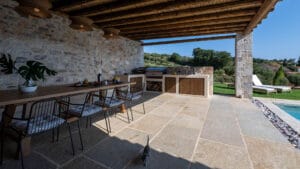 Garden dining area at Sagehill Stonehouse with outdoor table and seating