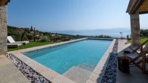 Swimming pool with sea view at Sagehill Stonehouse