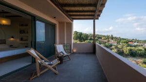 Master bedroom balcony with sea view at Sagehill Stonehouse